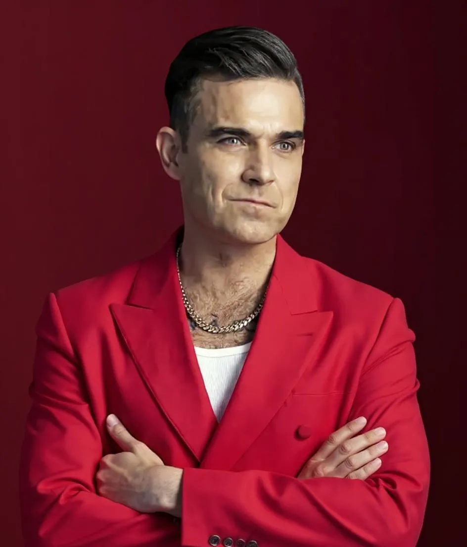 Robbie Williams are 16 albume No. 1 și îl depășește pe The Beatles