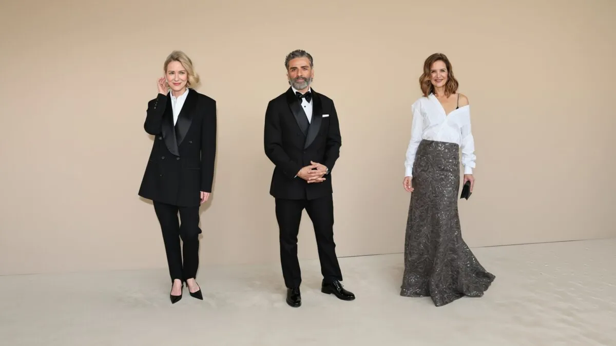Oscar Isaac și Katie Holmes la premiera filmului despre Brunello Cucinelli