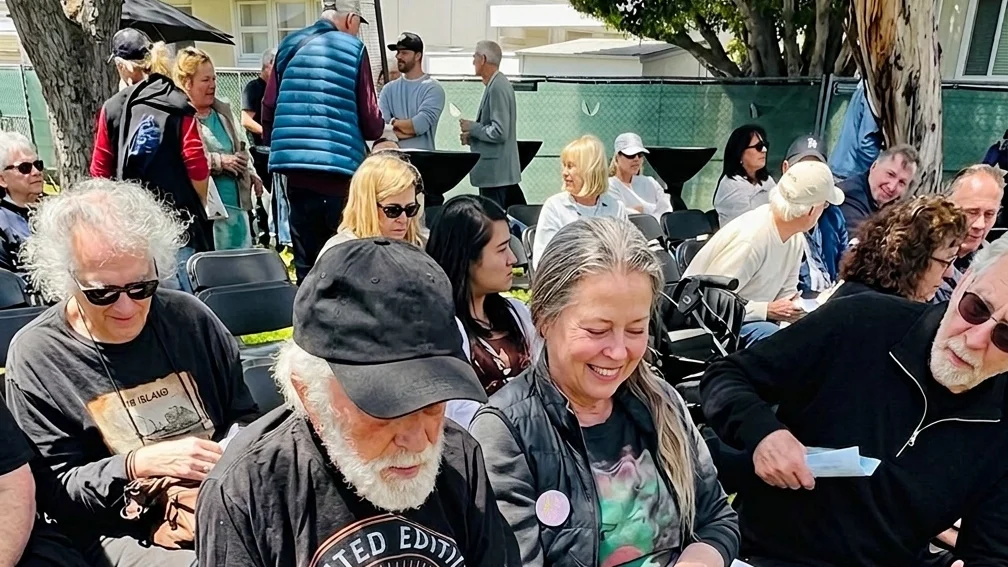 Dick Van Dyke dancing and laughing at a Malibu event alongside his wife Arlene Silver.