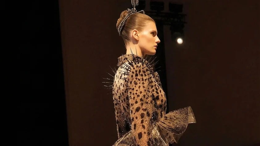 A model walked the Schiaparelli Spring 2026 Haute Couture runway in the crystal-embellished spiked look later worn by Chloé Zhao.