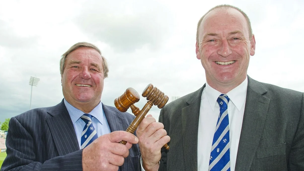 Clive Emson celebrates the opening of a Hampshire office