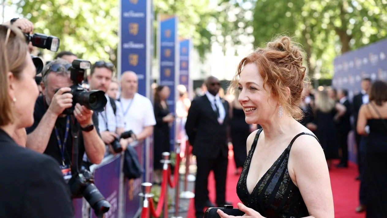 Katherine parkinson in black dress on red carpet