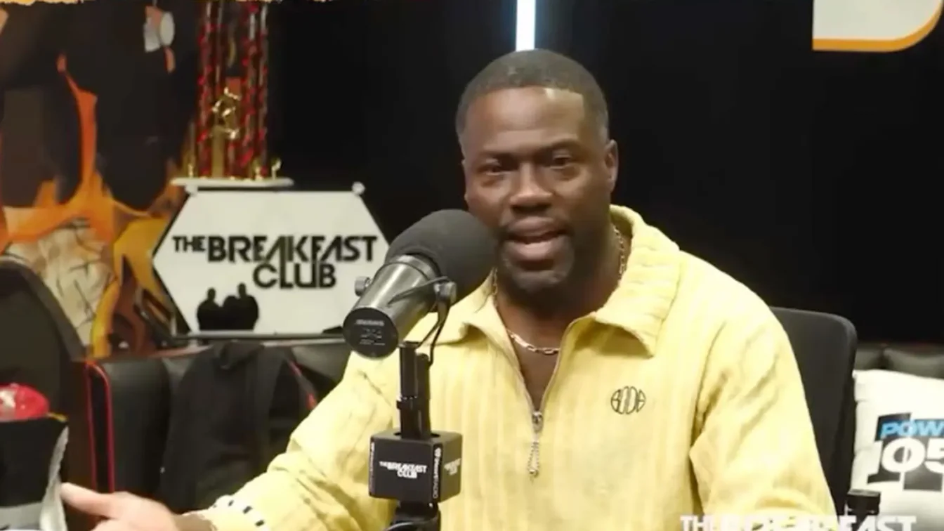 Kevin Hart speaking into a microphone on "The Breakfast Club."