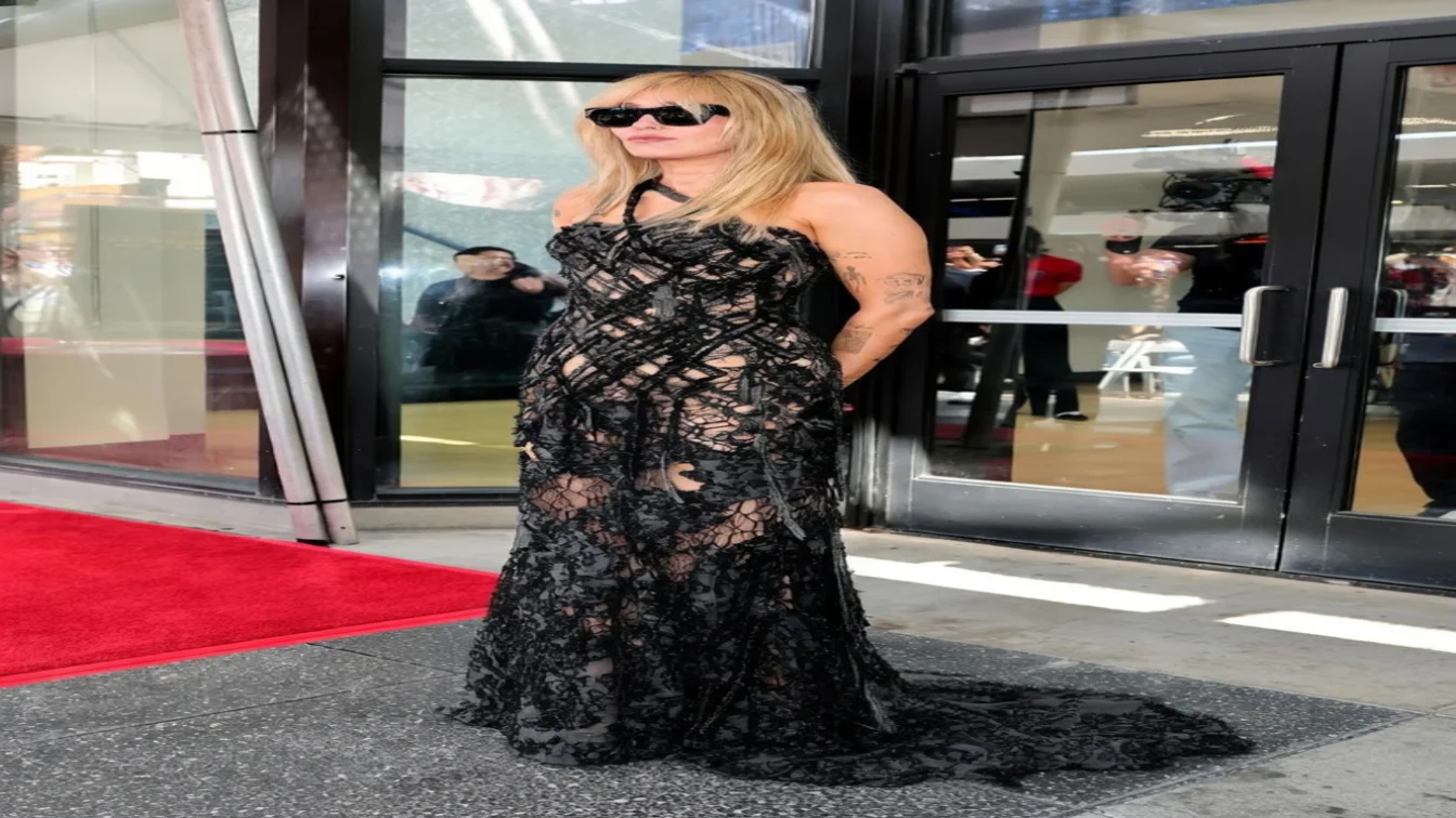 Miley Cyrus wearing archival Atelier Versace and sunglasses at her Hollywood Walk of Fame star ceremony
