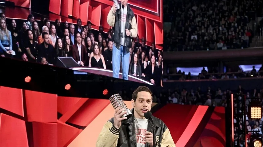 Pete Davidson accepts an award at the 30th Annual Webby Awards.