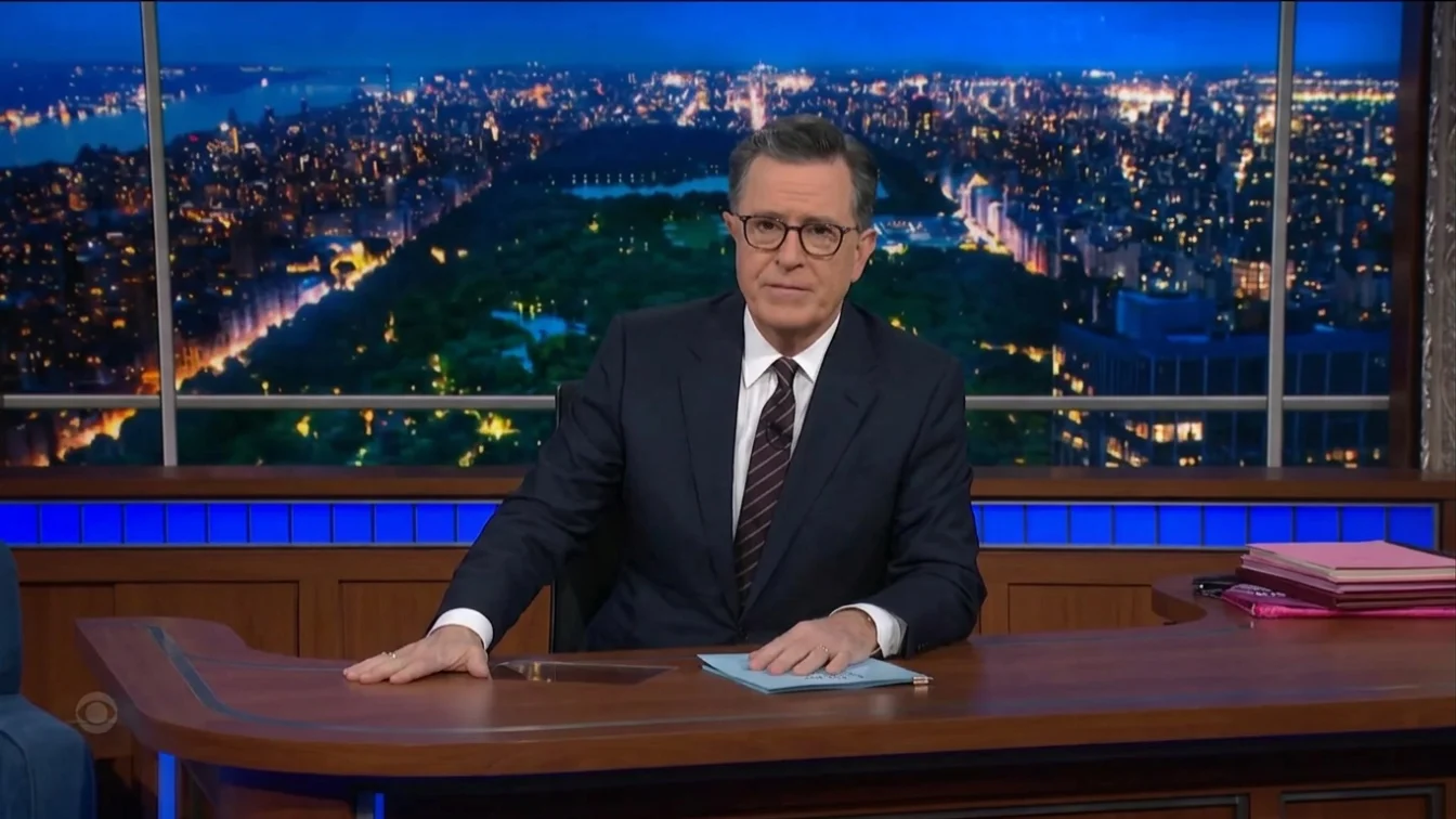 Stephen Colbert at his desk during the final week of The Late Show.