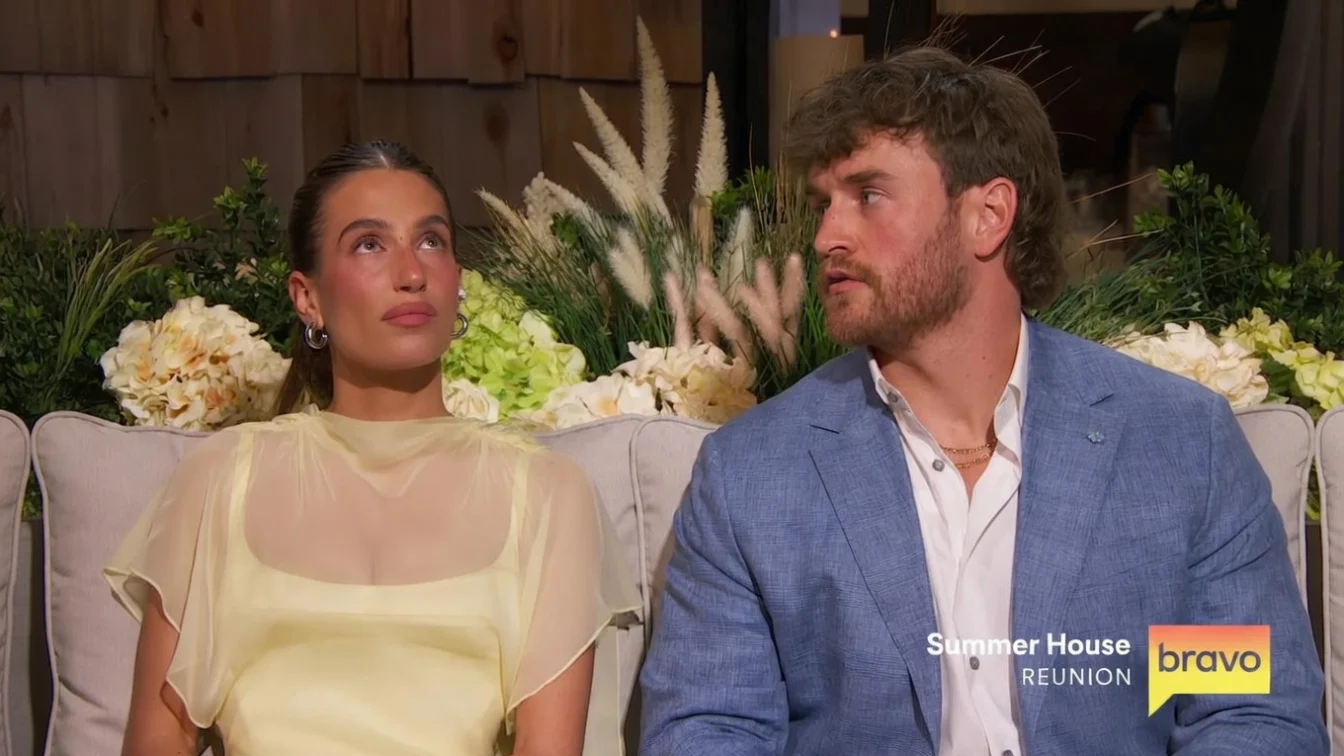 Ciara Miller and West Wilson on a couch during the Summer House reunion.