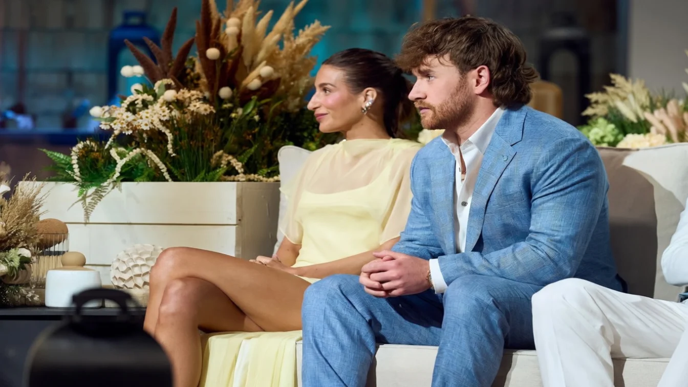 Amanda Batula and West Wilson sitting during the Summer House reunion.