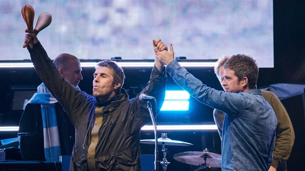 Liam Gallagher, left, and Noel Gallagher of Oasis appear during their reunion tour in Toronto