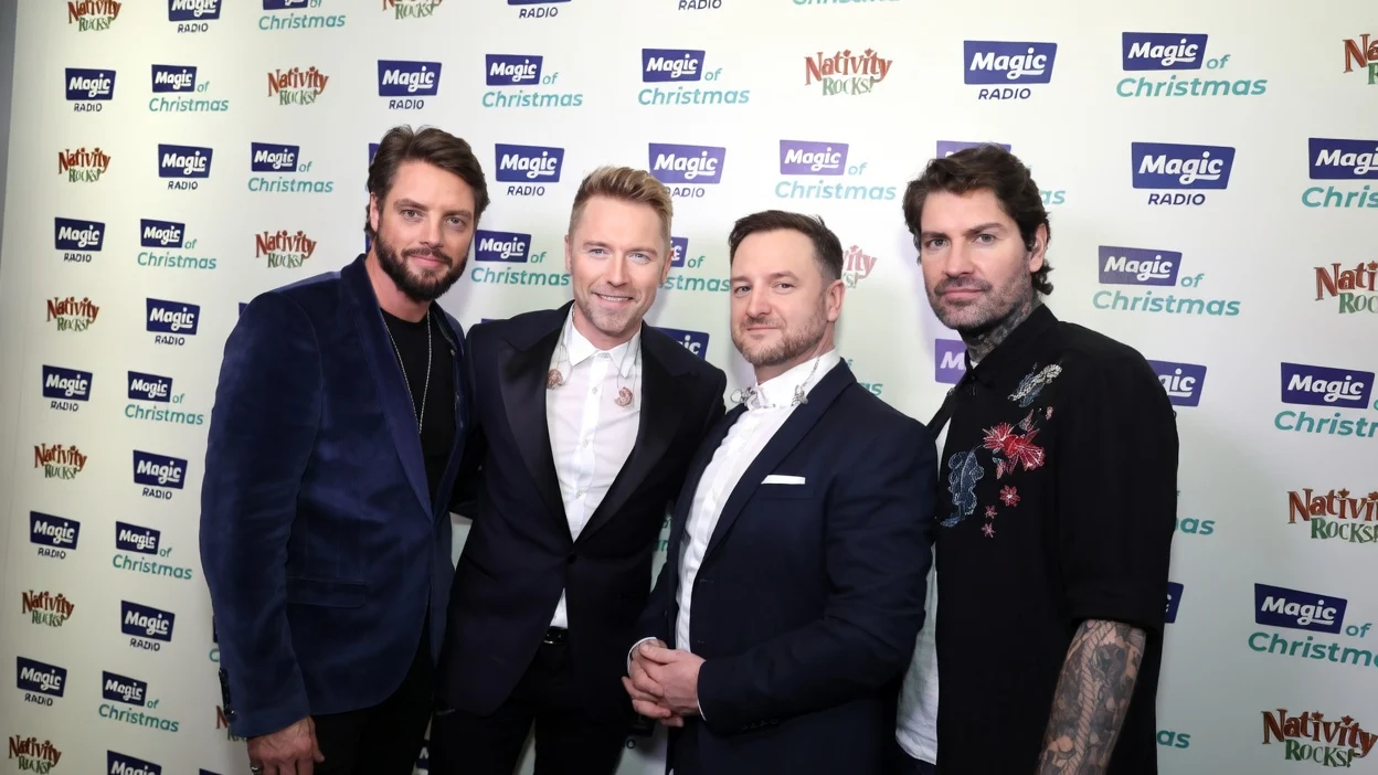Boyzone s-a reunit la Londra. Mikey Graham a cantat doar patru piese de pe scaun