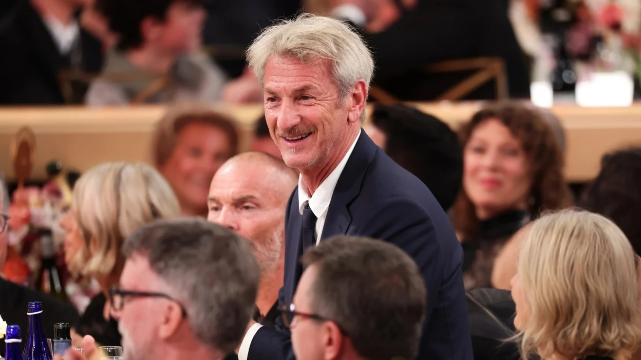 Sean Penn smiling at the 83rd Annual Golden Globes.
