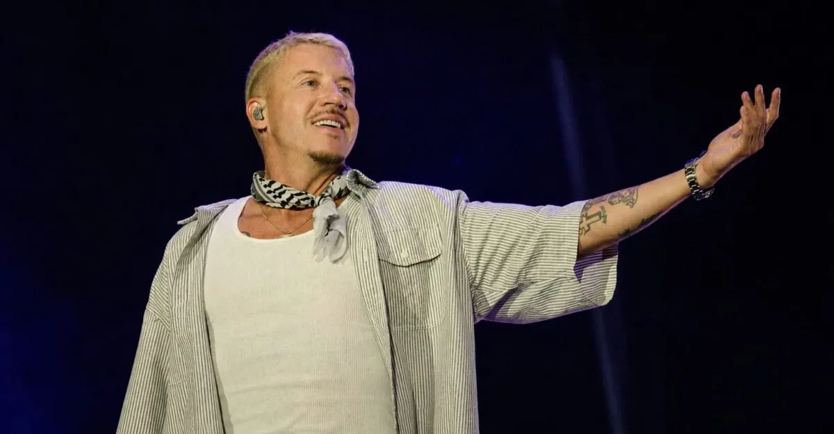 Macklemore riscă să fie scos din turneul lui Ed Sheeran după mesajul Free Palestine de la MetLife Stadium
